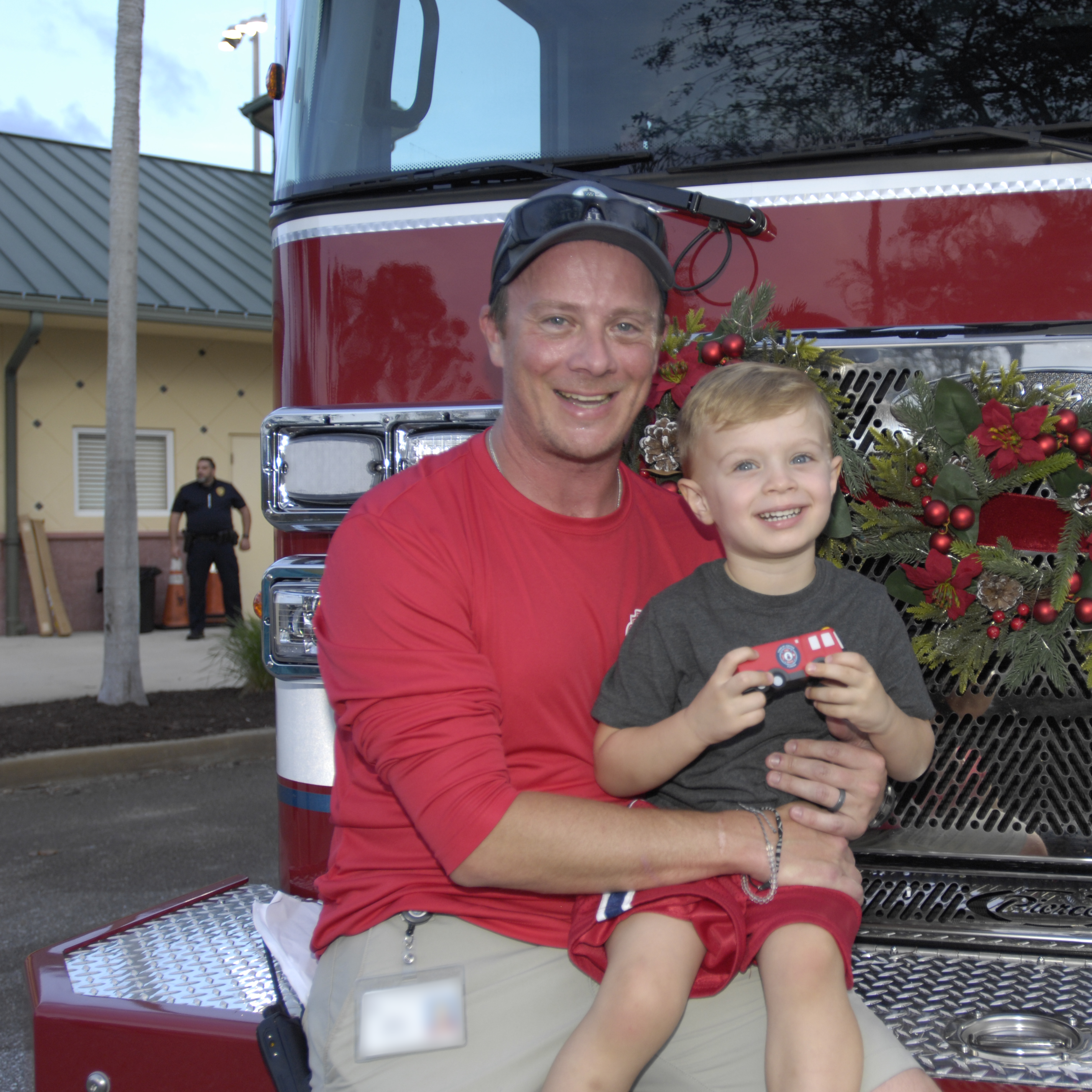Fire Truck Unveiling Father and Child