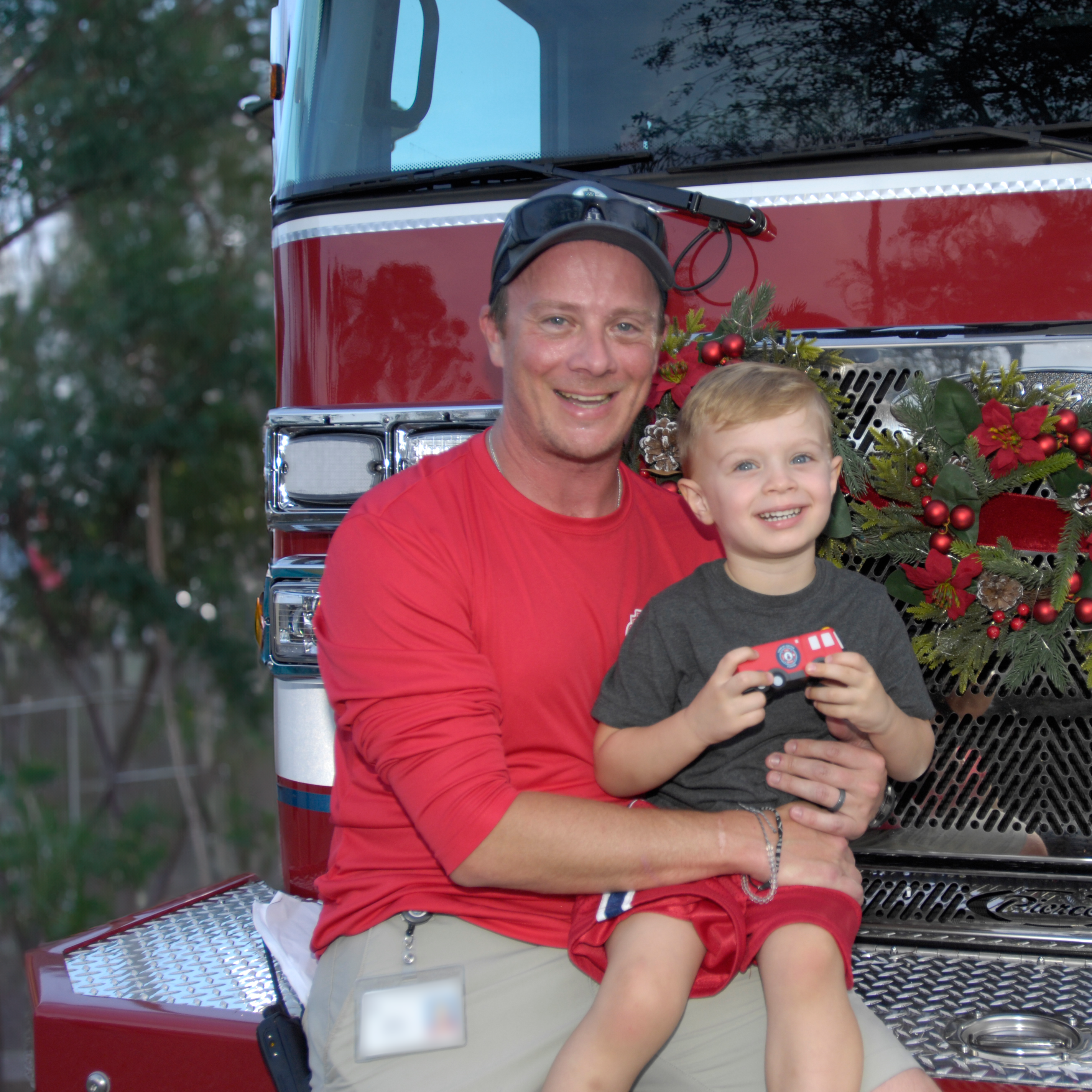 Fire Truck Unveiling Father and Child